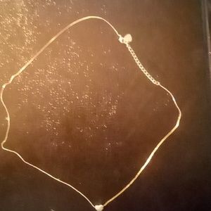 Lady's gold plated necklace w/ gold plated heart pendant